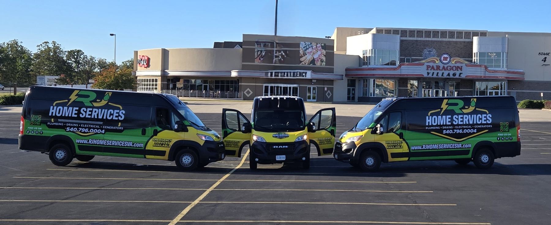 Three RJ Home Services vans parked side by side