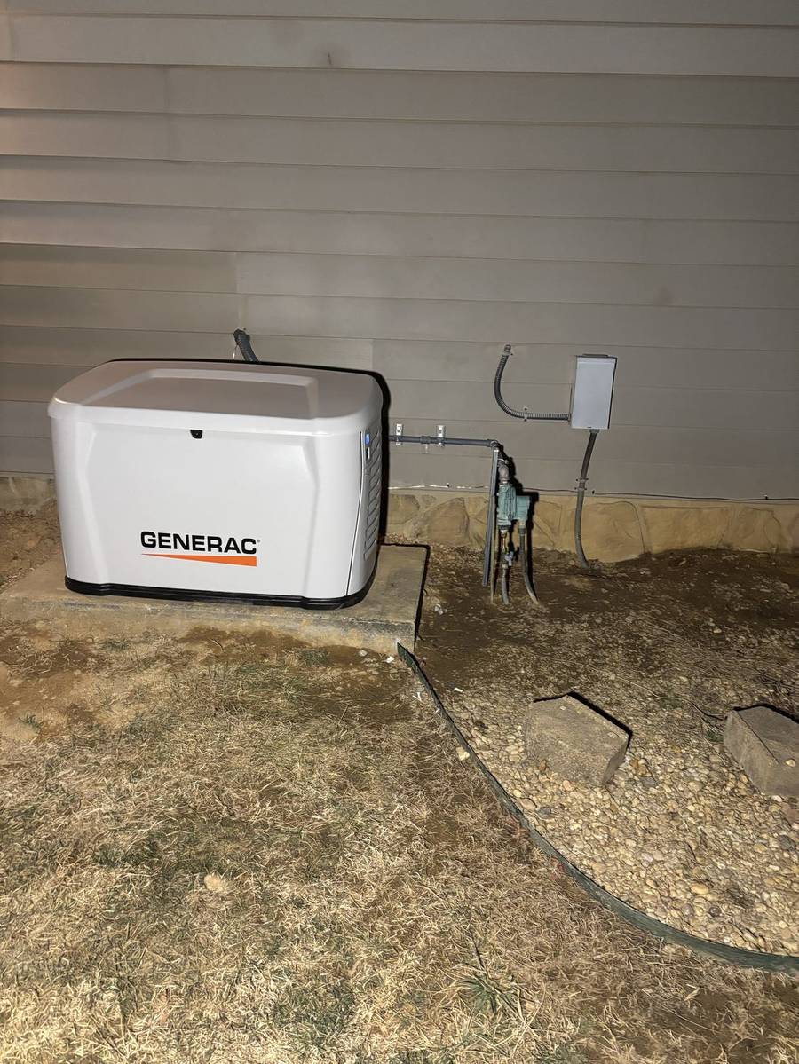 Generac standby generator installed on a new pad