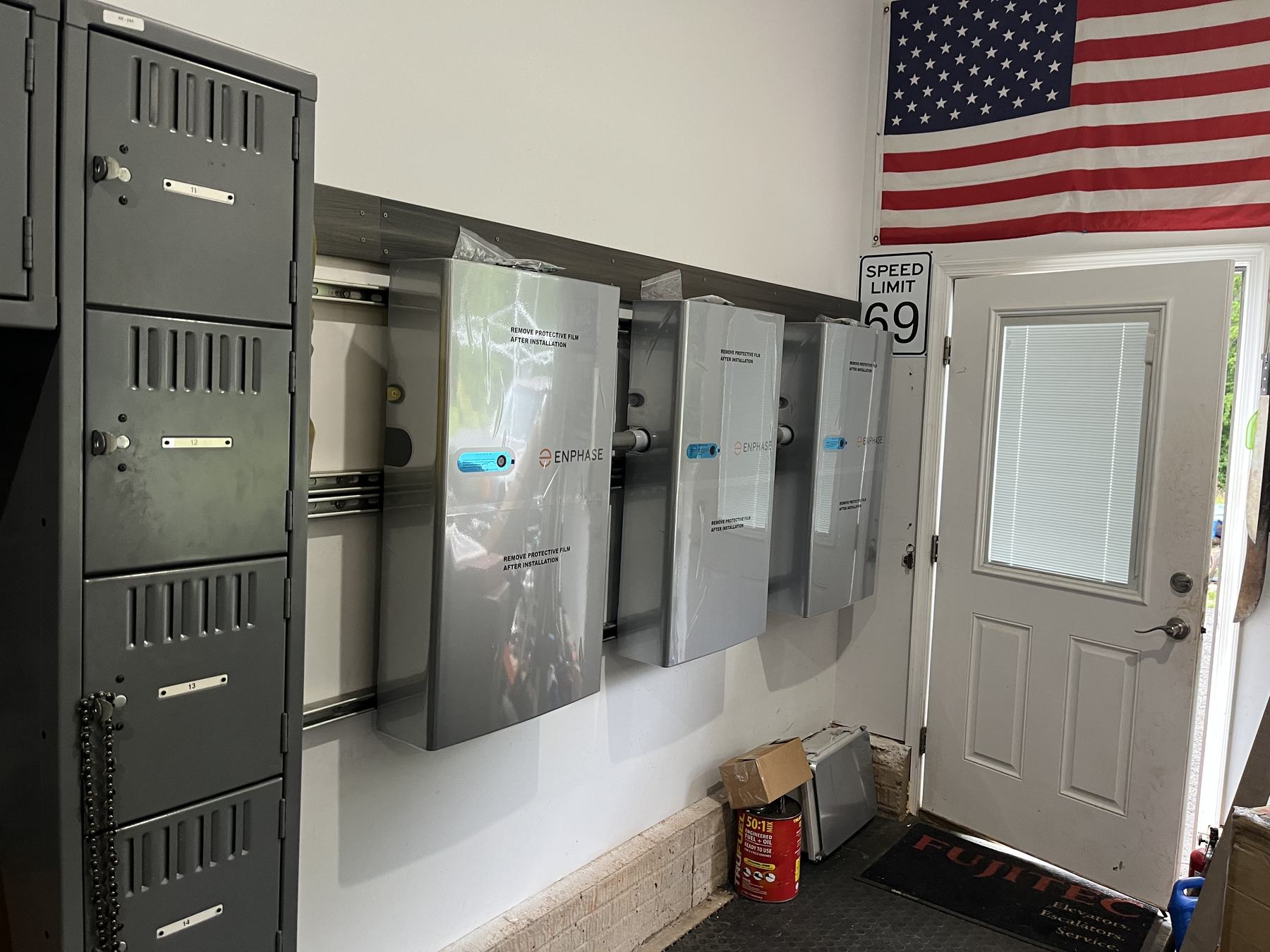 Home electrical equipment mounted on a garage wall